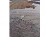 «Учаскеде су өткізгіш құбыр жоқ»: Автожолда су өту дерегі анықталды