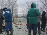 Ұшқыштар су басқан ғимарат төбесіндегі адамдарды құтқарды